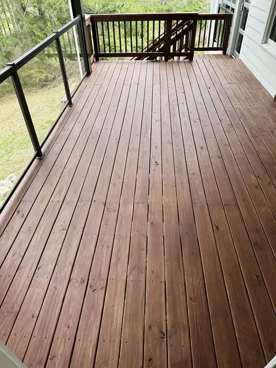 A customer's deck after staining, shot by the homeowner